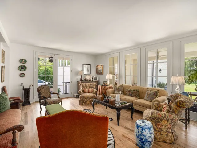 a kitchen with granite countertop a sink stove and refrigerator