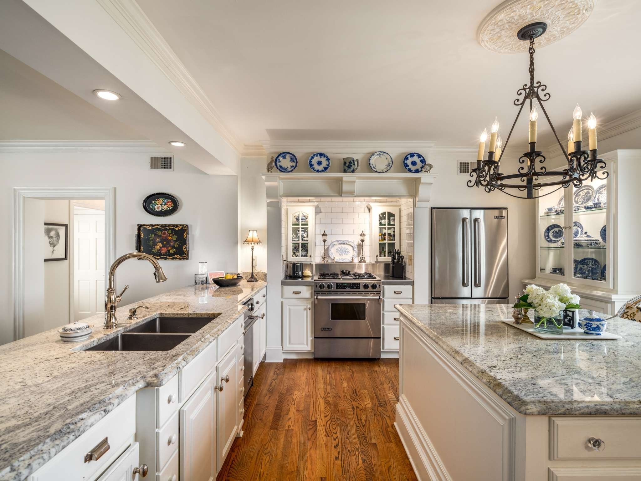 305 Davidson Road Nashville, TN 37205 - Photo 17 of 73 a kitchen with granite countertop a sink stove and refrigerator