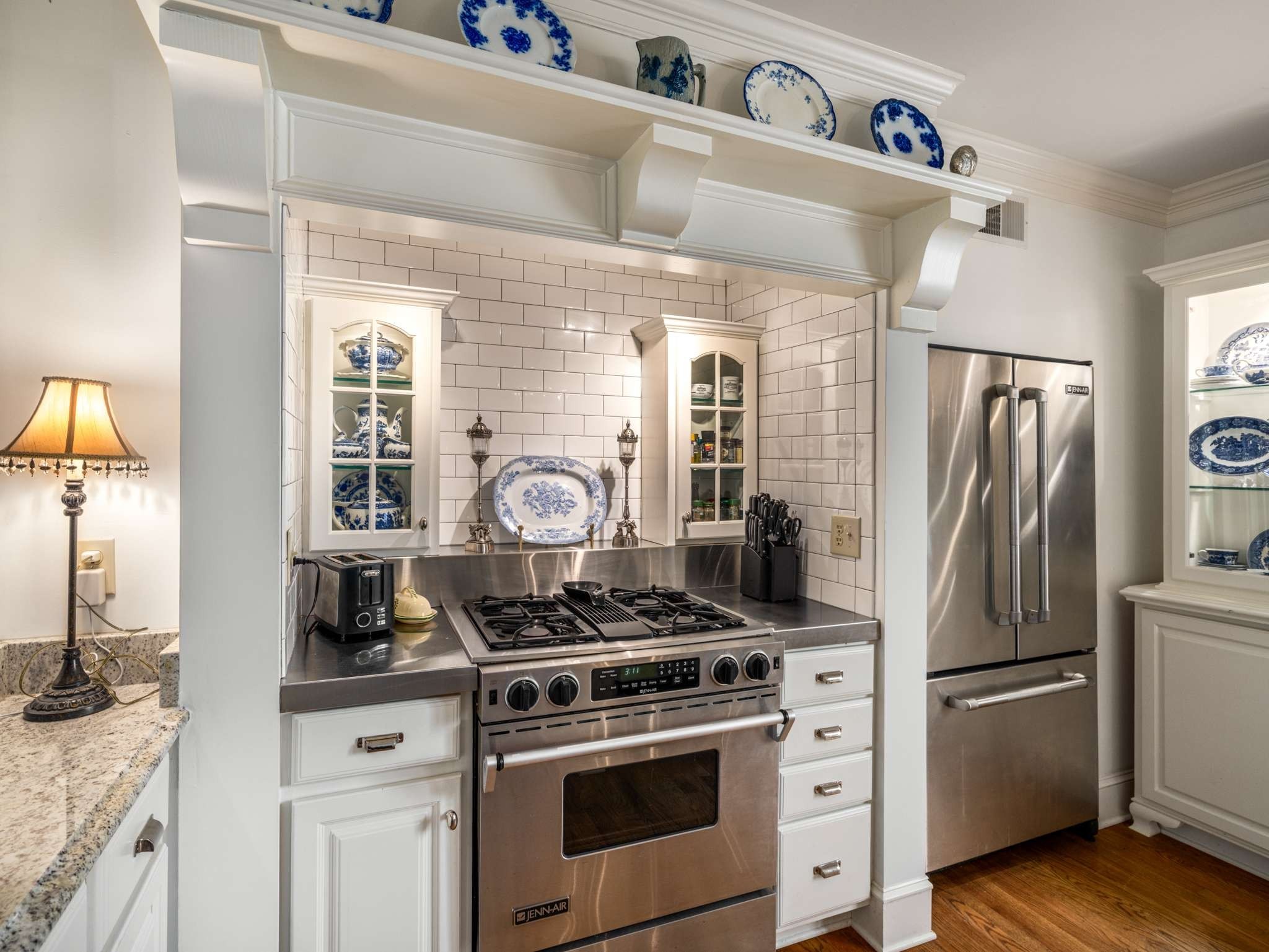 305 Davidson Road Nashville, TN 37205 - Photo 19 of 73 a kitchen with a stove a sink and a refrigerator