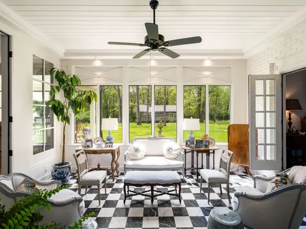 a living room with furniture and a window