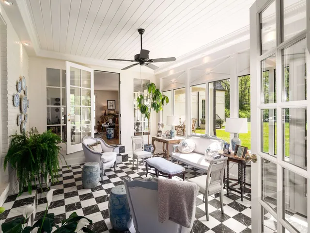 a room with furniture and a wooden floor