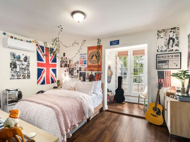 a very nice looking living room with furniture and a flat screen tv