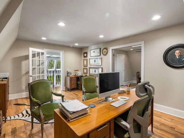 a front view of a house with a garden and porch