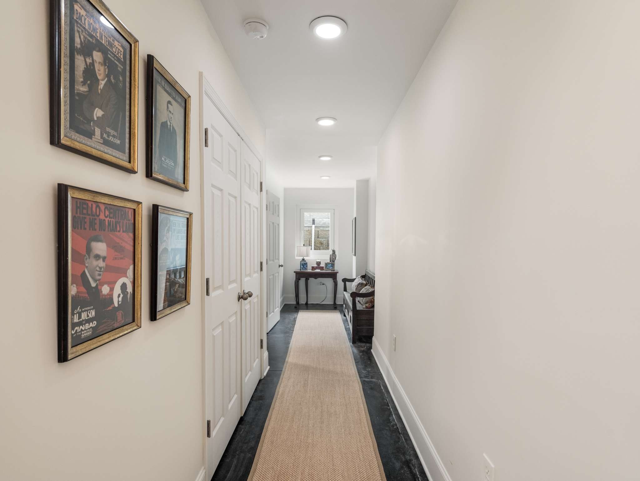 305 Davidson Road Nashville, TN 37205 - Photo 48 of 73 a view of a hallway with paintings on the wall
