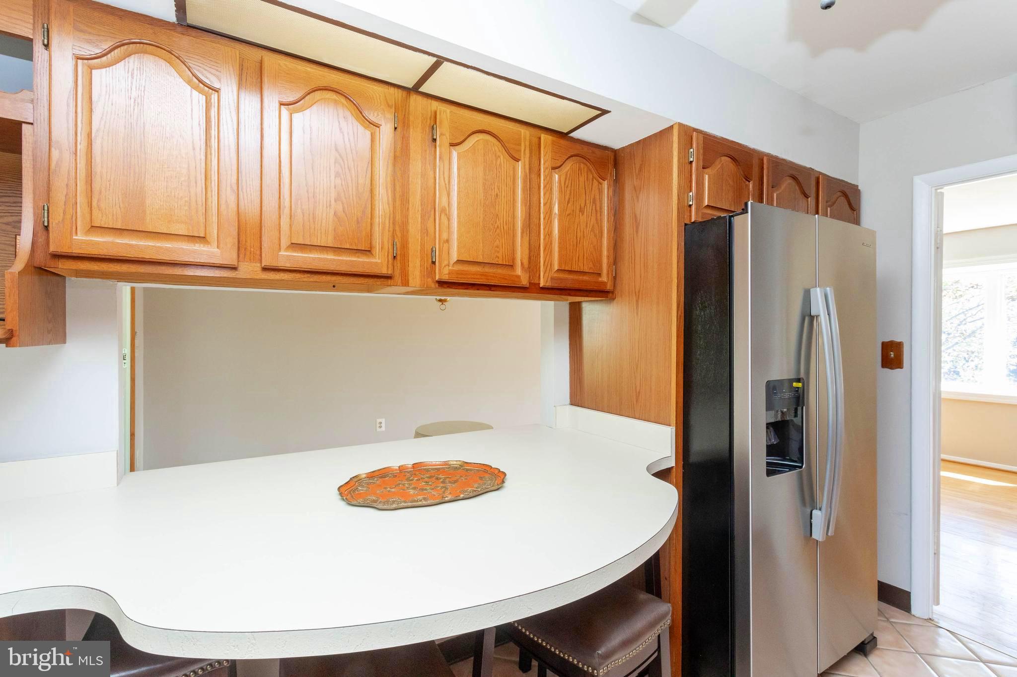 1622 Weyburn Road Baltimore, MD 21237 - Photo 21 of 45 Eat-In Kitchen/Breakfast Bar opens to Dining room