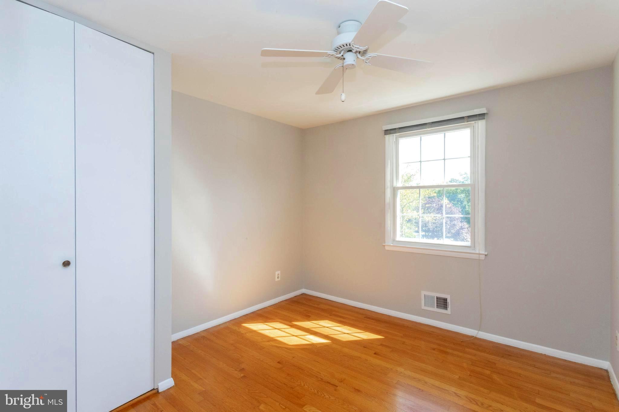 1622 Weyburn Road Baltimore, MD 21237 - Photo 24 of 45 Bedroom 1 with hardwood floors and ceiling fan