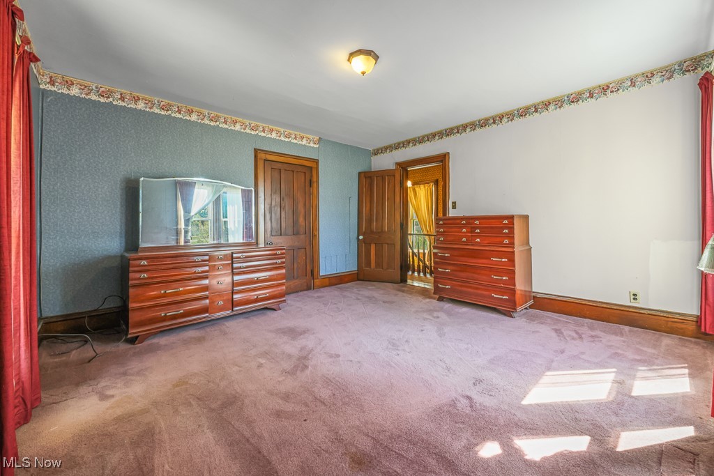 6727 Waterloo Road Atwater, OH 44201 - Photo 27 of 48 Unfurnished bedroom with carpet flooring and wallpapered walls
