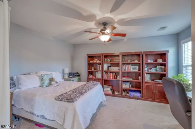 a balcony with furniture and wooden floor