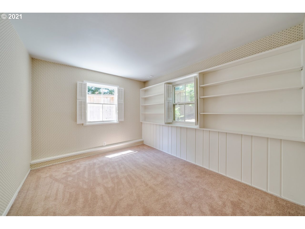 3939 Southwest Altadena Avenue Portland, OR 97239 - Photo 19 of 31 a view of an empty room with a window