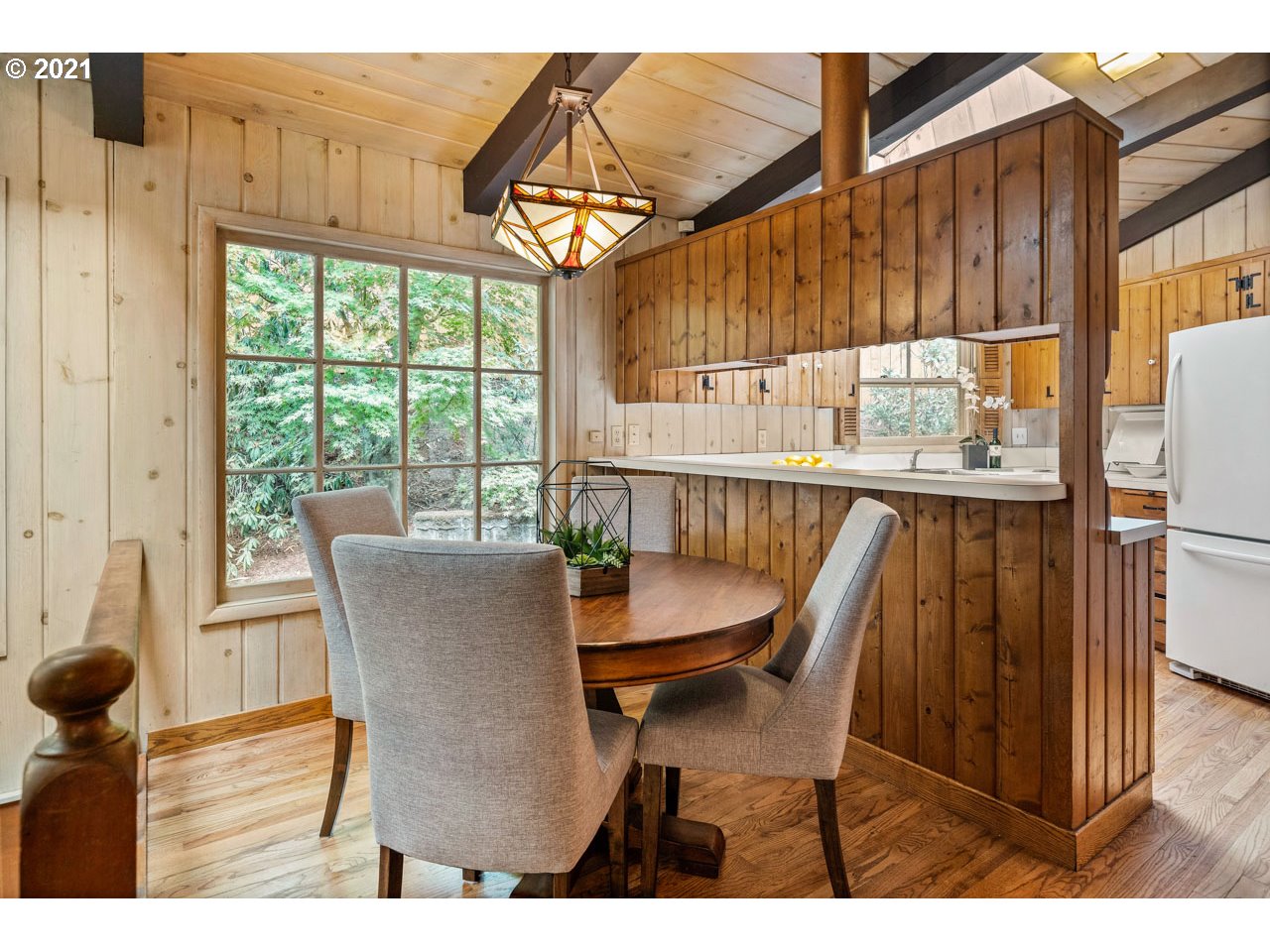 3939 Southwest Altadena Avenue Portland, OR 97239 - Photo 8 of 31 a view of a dining room with furniture window and outside view