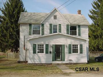322 Sterner Street Confluence, PA 15424 - Photo 1 of 1 a front view of a house with a garden