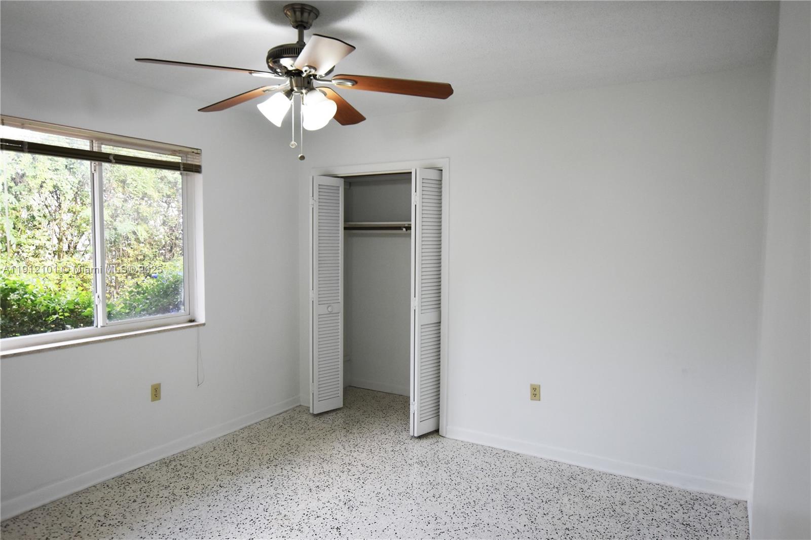 1532 Southwest 23rd Street, Unit 1532 Miami, FL 33145 - Photo 6 of 11 a view of an empty room with a window