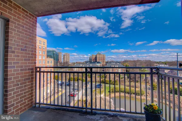 a view of a balcony with city view