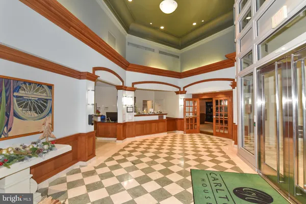 a outdoor space with lots of chairs and mirrors