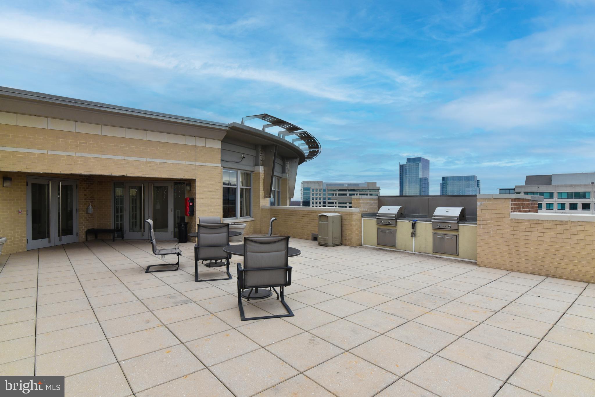 11800 Sunset Hills Road, Unit 823 Reston, VA 20190 - Photo 34 of 46 rooftop and entertainment space adjacent
