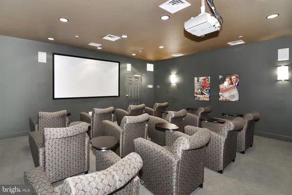 a room with pool table and windows