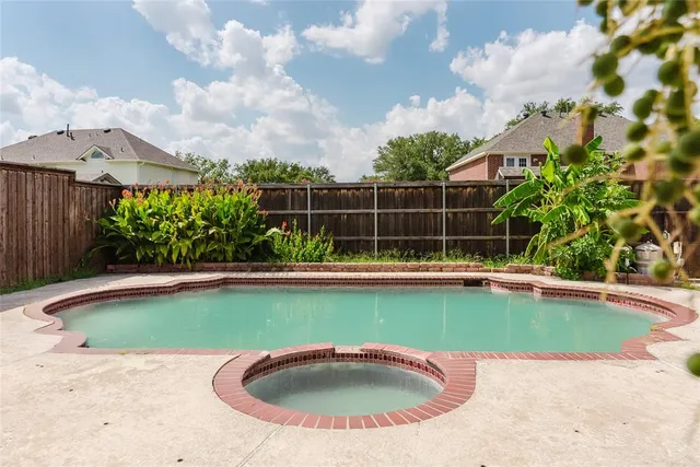 a view of a swimming pool and outdoor space