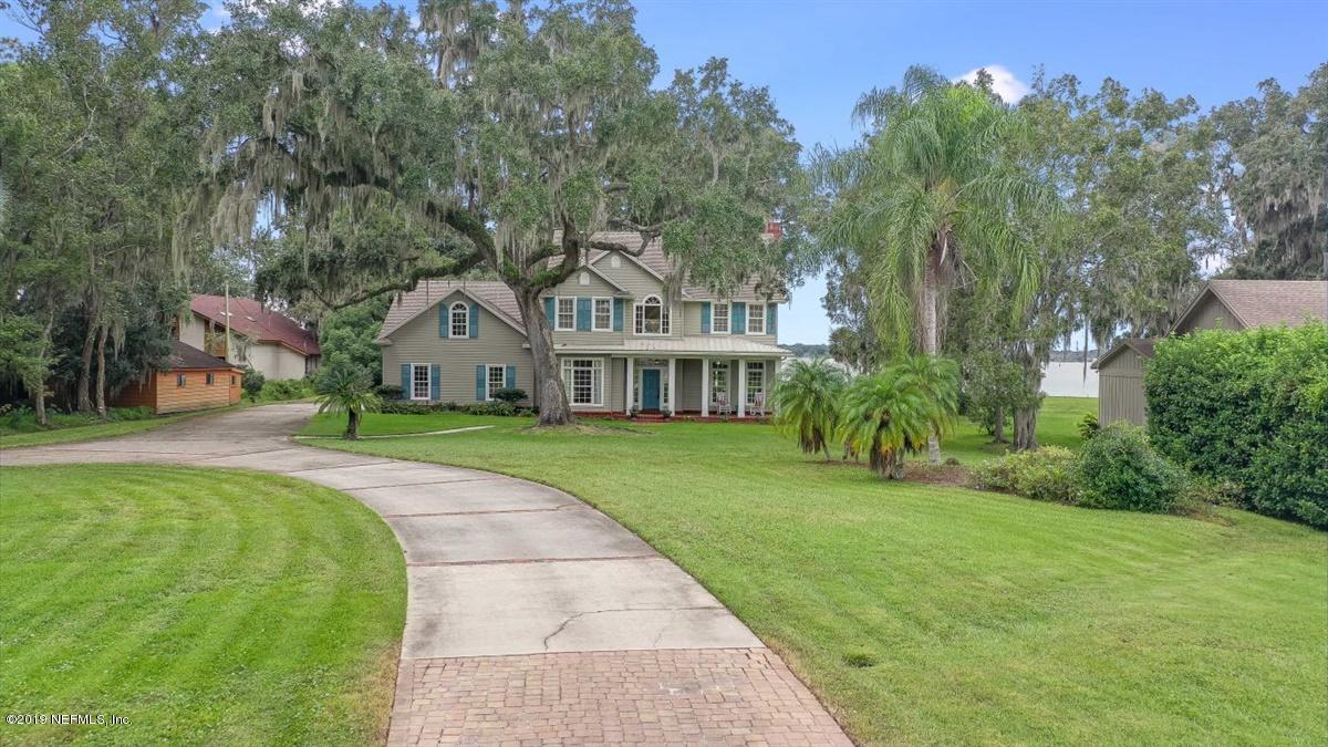 13056 Mandarin Road Jacksonville, FL 32223 - Photo 3 of 45 a front view of house with yard and green space
