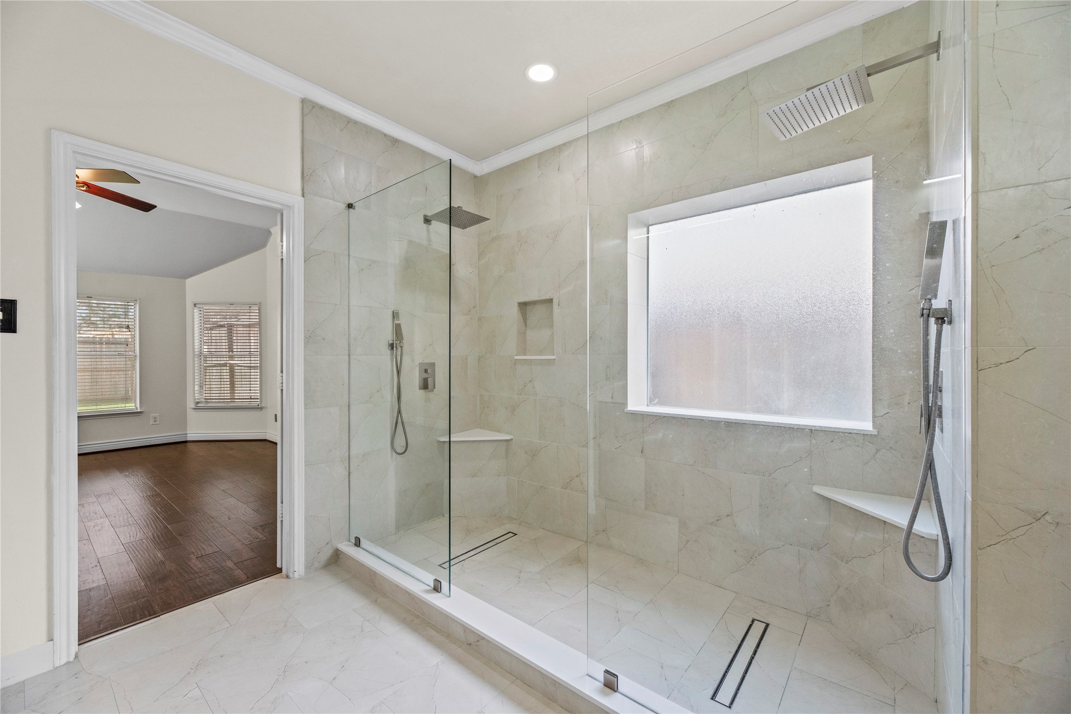 402 Spring Trace Court Houston, TX 77094 - Photo 19 of 35 a bathroom with a glass shower door