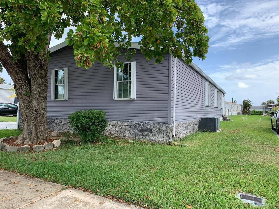 1700 Southwest 66th Avenue Boca Raton, FL 33428 - Photo 1 of 14 front of the house
