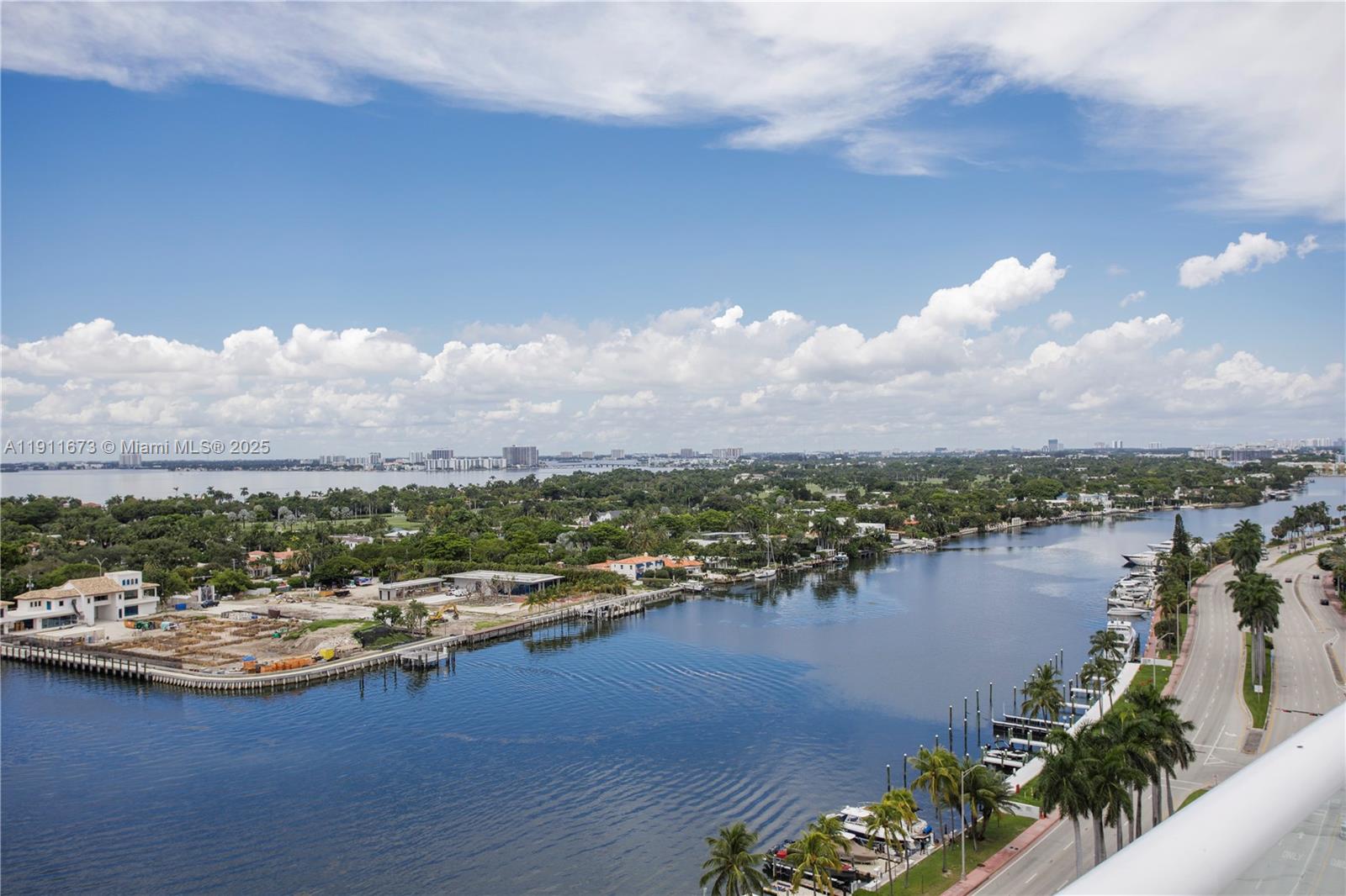 5001 Collins Avenue, Unit PH1 Miami Beach, FL 33140 - Photo 47 of 82 a view of a lake with a city