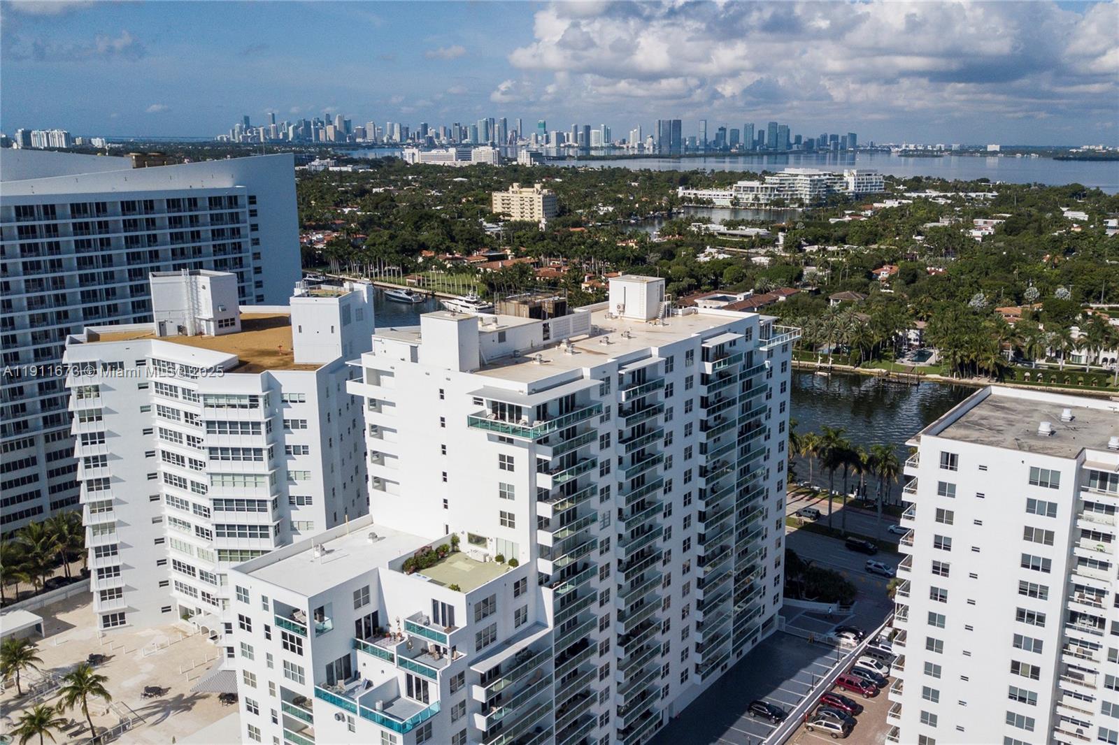 5001 Collins Avenue, Unit PH1 Miami Beach, FL 33140 - Photo 62 of 82 a view of a city with tall buildings