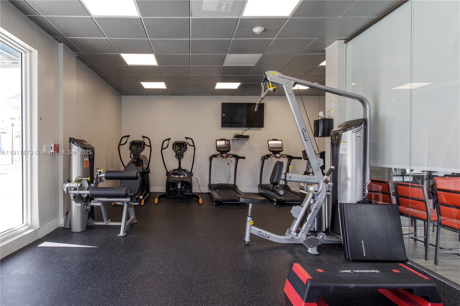 5001 Collins Avenue, Unit PH1 Miami Beach, FL 33140 - Photo 76 of 82 a view of a room with gym equipment