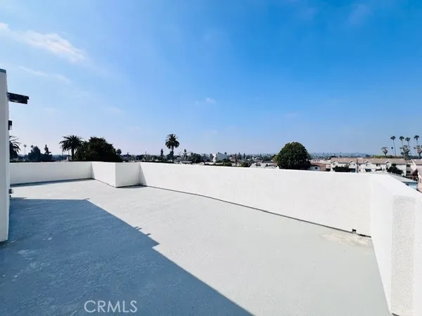 a view of kitchen with wooden floor