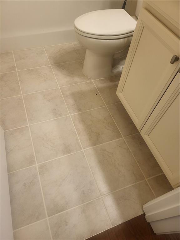 2595 Jupiter Drive Southwest Powder Springs, GA 30127 - Photo 12 of 26 a bathroom with a toilet and a shower