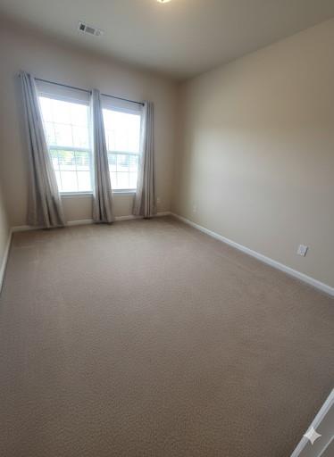2595 Jupiter Drive Southwest Powder Springs, GA 30127 - Photo 23 of 26 an empty room with windows