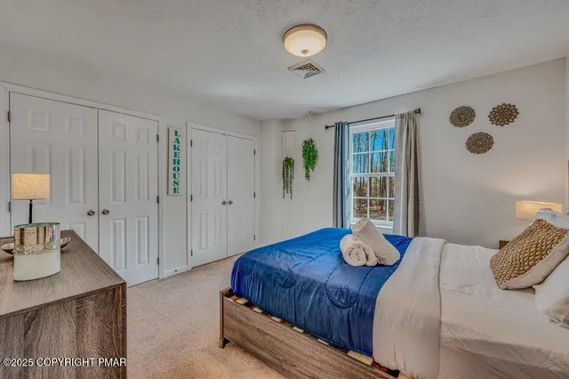 a view of staircase with white walls