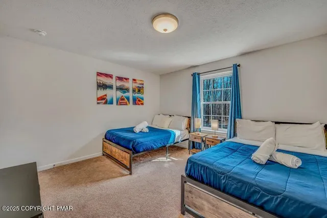 a bathroom with a sink a mirror and a window