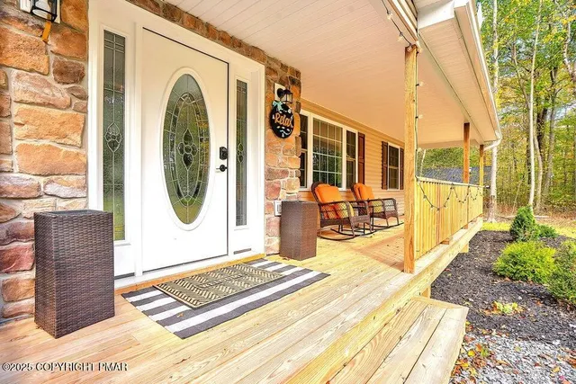 a view of a swimming pool with a lounge chair