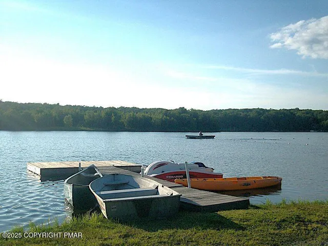 a garden view with a lake view