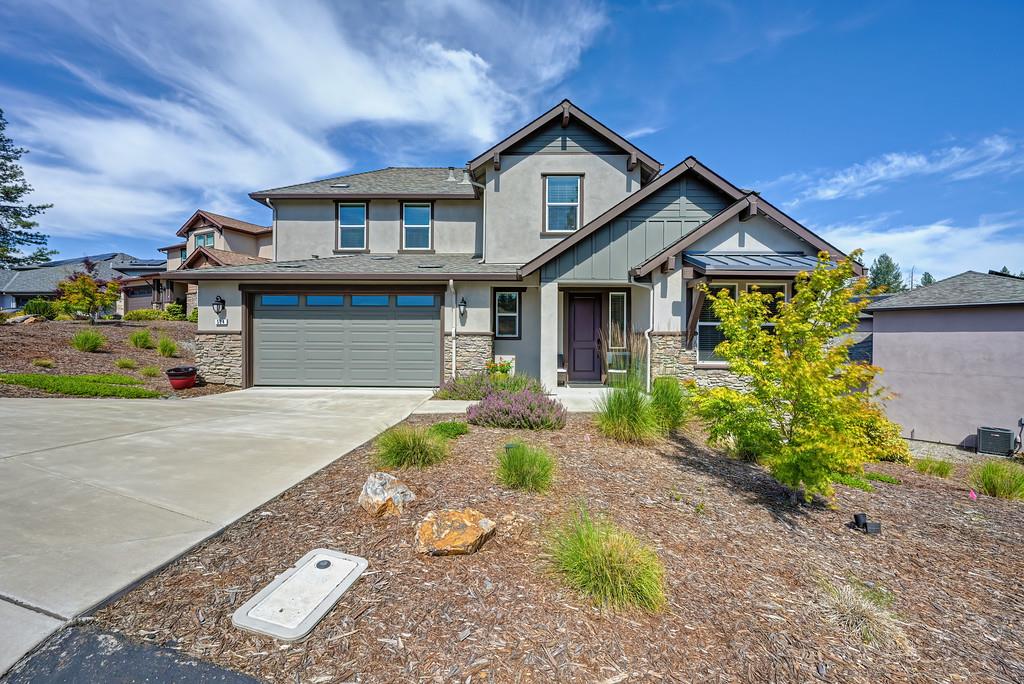 504 Chase Court Colfax, CA 95713 - Photo 19 of 94 a front view of a house with a yard and garage