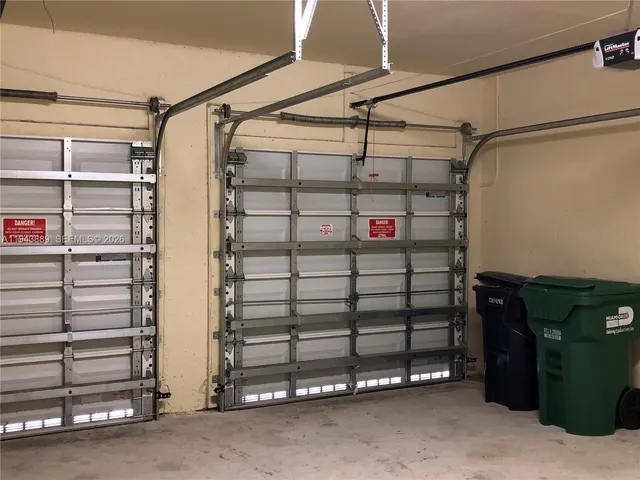 a view of a park with large trees