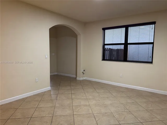 a view of a backyard of the house