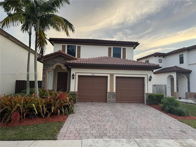 a view of an empty room with stairs