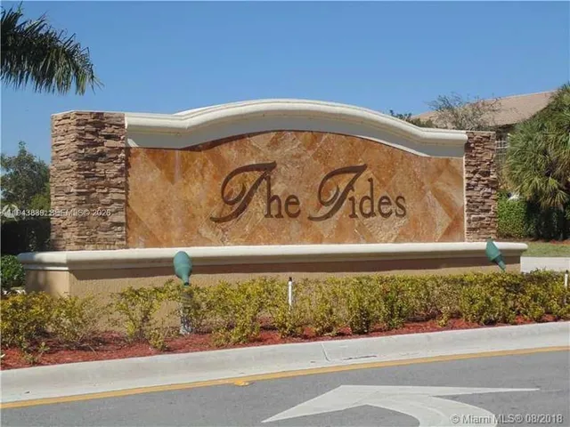 a view of a lake with a garden