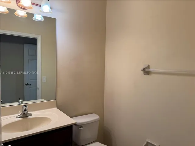 a view of staircase with wooden floor