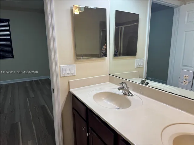 a bathroom with a shower and a toilet