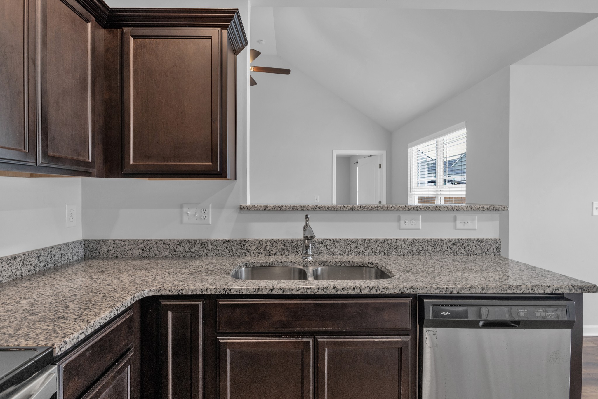 328 Turney Lane Spring Hill, TN 37174 - Photo 15 of 35 a kitchen with granite countertop a sink and cabinets