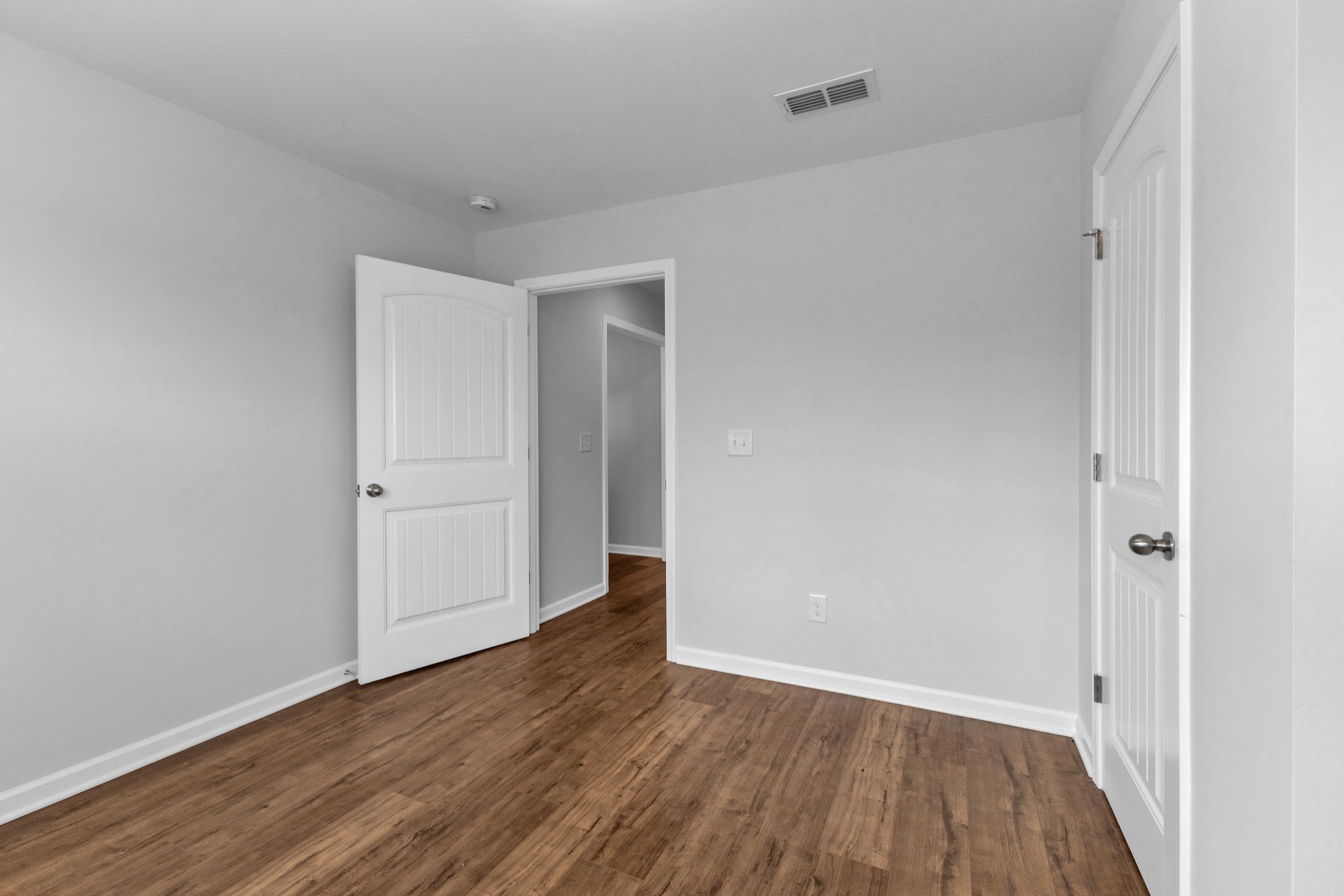 328 Turney Lane Spring Hill, TN 37174 - Photo 22 of 35 a view of an empty room with wooden floor