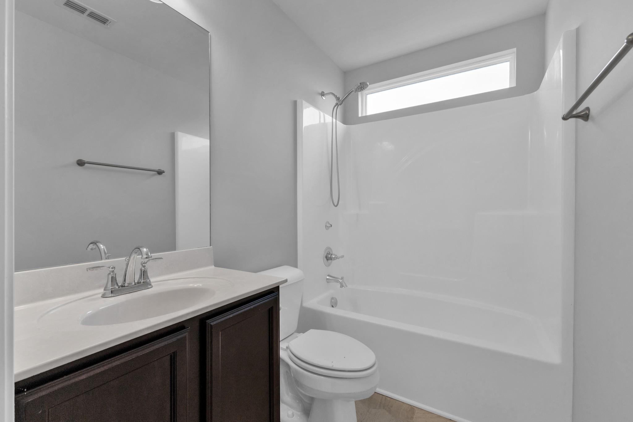 328 Turney Lane Spring Hill, TN 37174 - Photo 25 of 35 a bathroom with a sink a toilet and shower