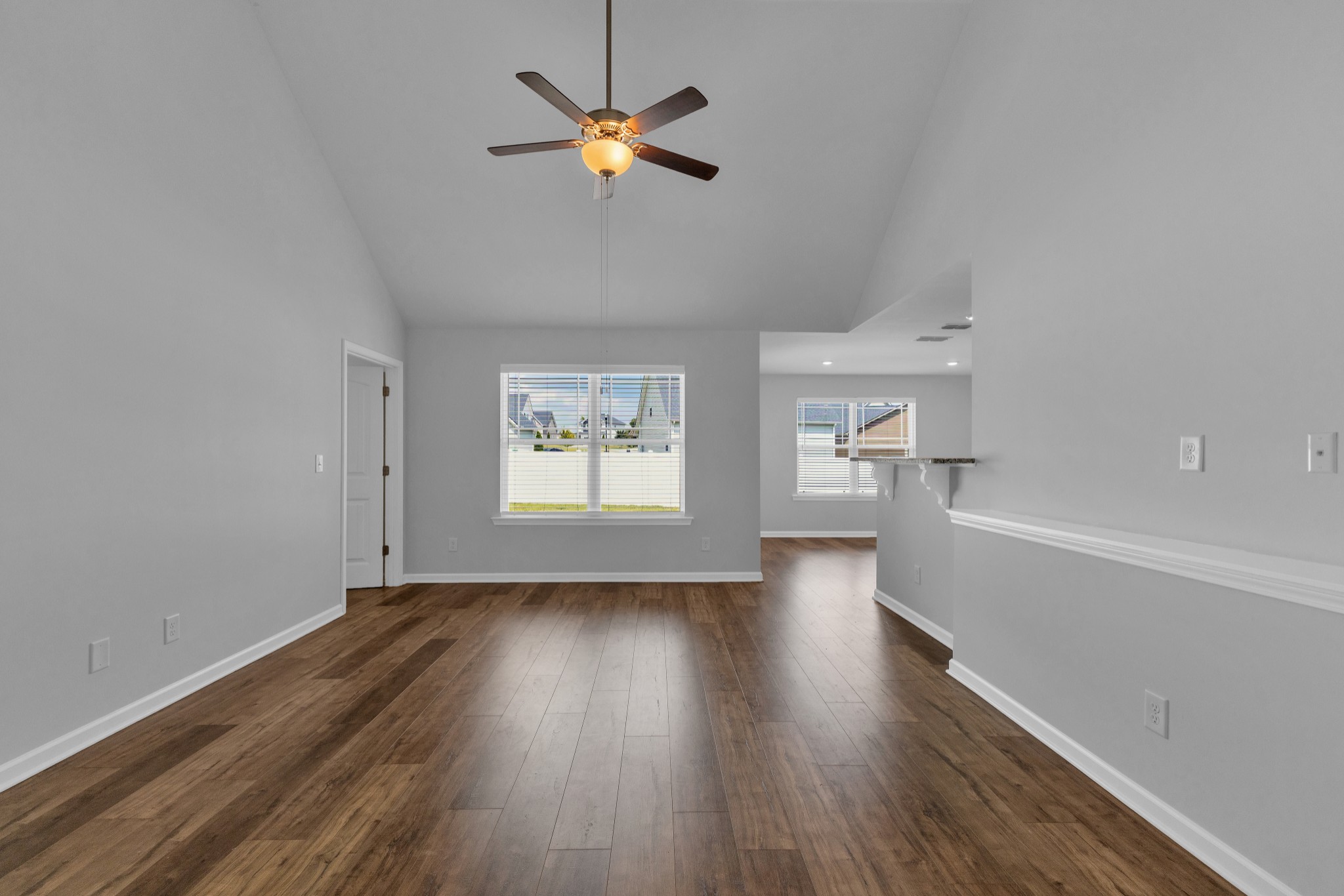 328 Turney Lane Spring Hill, TN 37174 - Photo 8 of 35 wooden floor in an empty room with a window