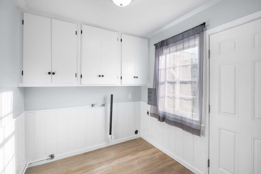 6650 Palm Avenue Riverside, CA 92506 - Photo 12 of 18 a view of an empty room with wooden floor and a window