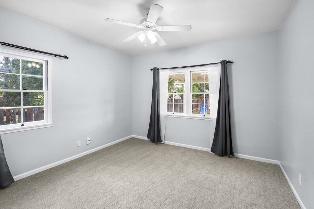 6650 Palm Avenue Riverside, CA 92506 - Photo 18 of 18 an empty room with windows and fan