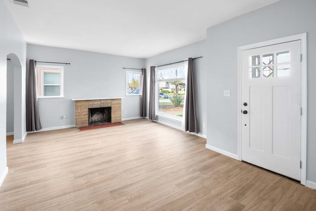 6650 Palm Avenue Riverside, CA 92506 - Photo 4 of 18 a view of empty room with wooden floor and a window