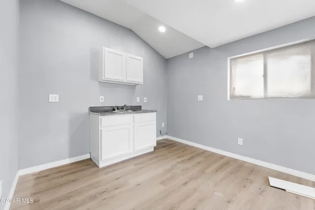 a bathroom with a toilet and a sink