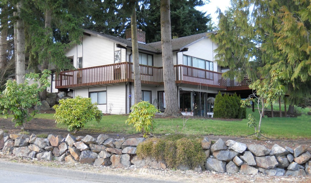 1915 234th Place Southwest Bothell, WA 98021 - Photo 1 of 1 front view of a house with a garden